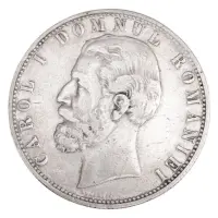 Румыния 5 леев 1880 года, Имя дизайнера рядом с гуртом